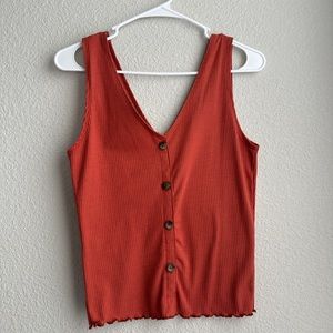 CAUTION TO THE WIND ORANGE TANK TOP